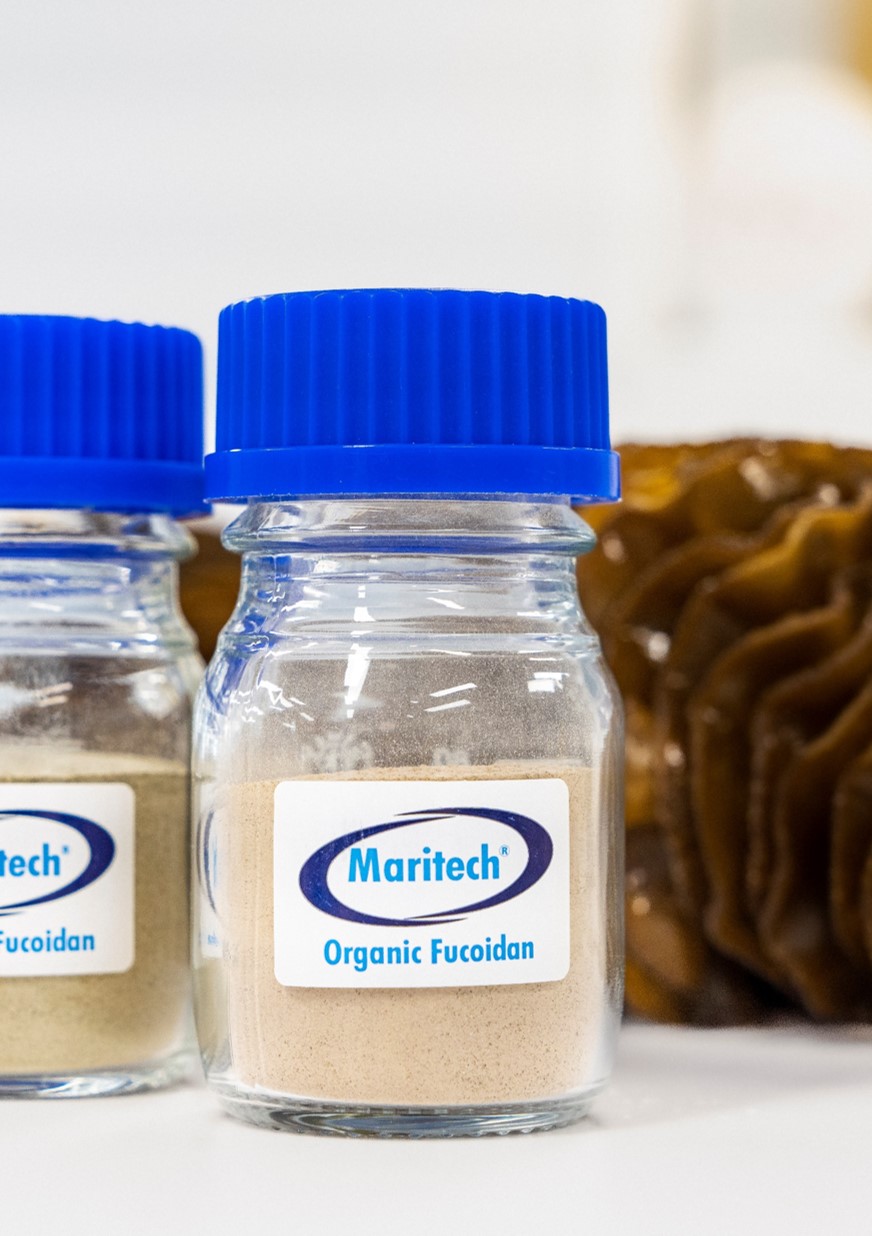 Maritech branded sample jars sitting on laboratory countertop